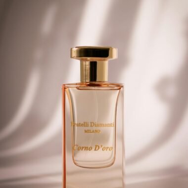 A luxurious perfume bottle with a gold cap, exuding elegance.
